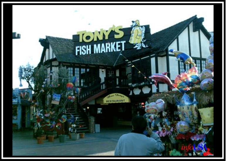 Entrance of Tony's Fish Market with vibrant decorations.